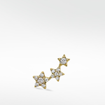 Lark & Berry's 3-Star Diamond Stud earring in a curved cluster, with pavé diamonds in yellow gold. Left ear option.