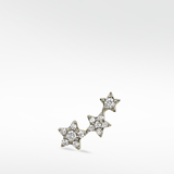Left ear option of the 3-Star Diamond Stud, featuring a rising cluster of three stars paved with brilliant round diamonds.