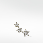 The 3-Star Diamond Stud earring for the right ear, with three stars in a rising curve studded with brilliant diamonds.