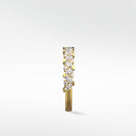Side view of the Abelia Diamond Ring in yellow gold, featuring a unique cluster of marquise and round diamonds.