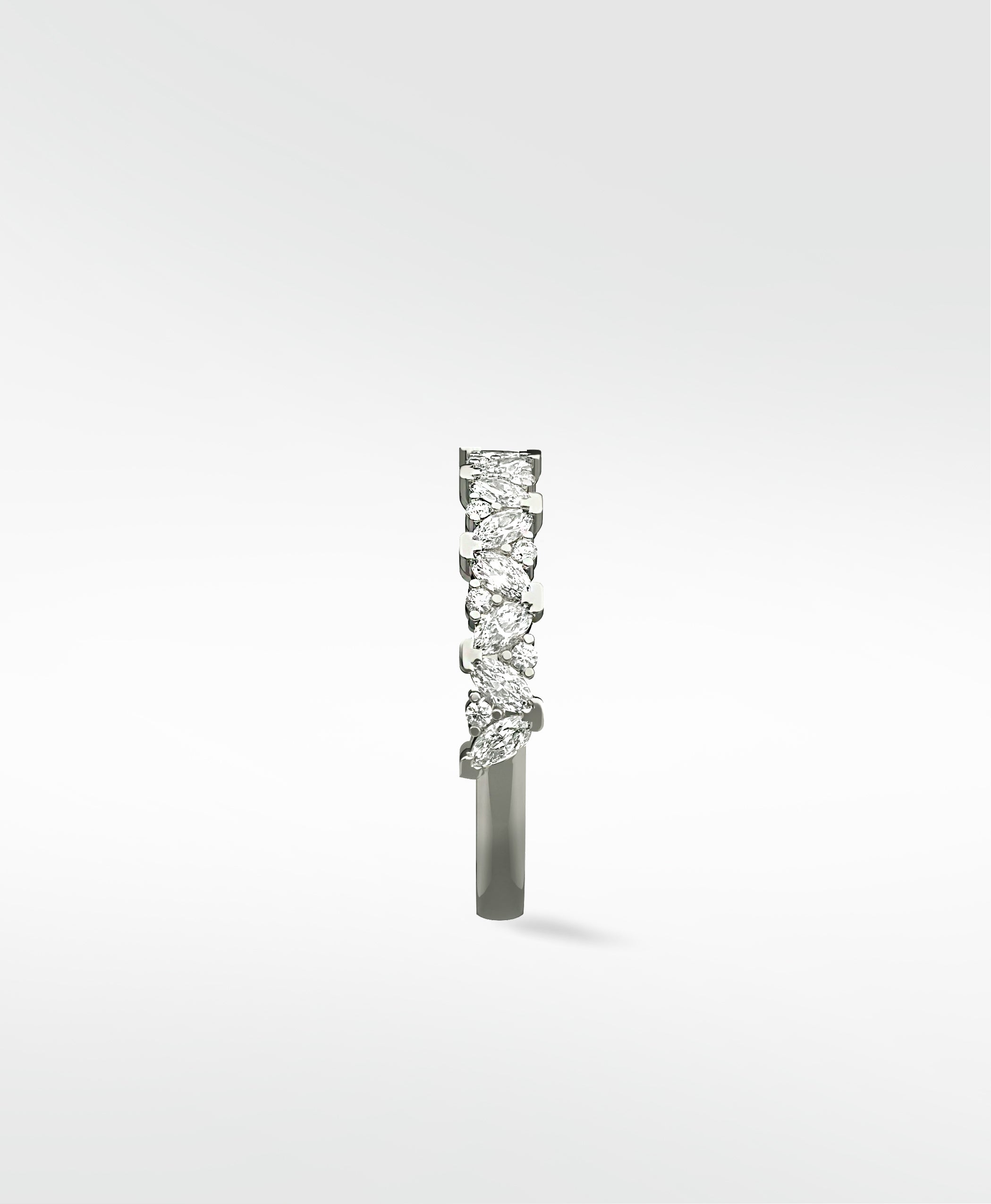 Side view of the Lark & Berry Abelia Diamond Ring, showing its contemporary band with marquise and round diamonds.