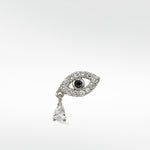 Lark & Berry Evil Eye stud in 14k white gold with a sapphire center, diamond pavé, and a pear-shaped diamond drop.