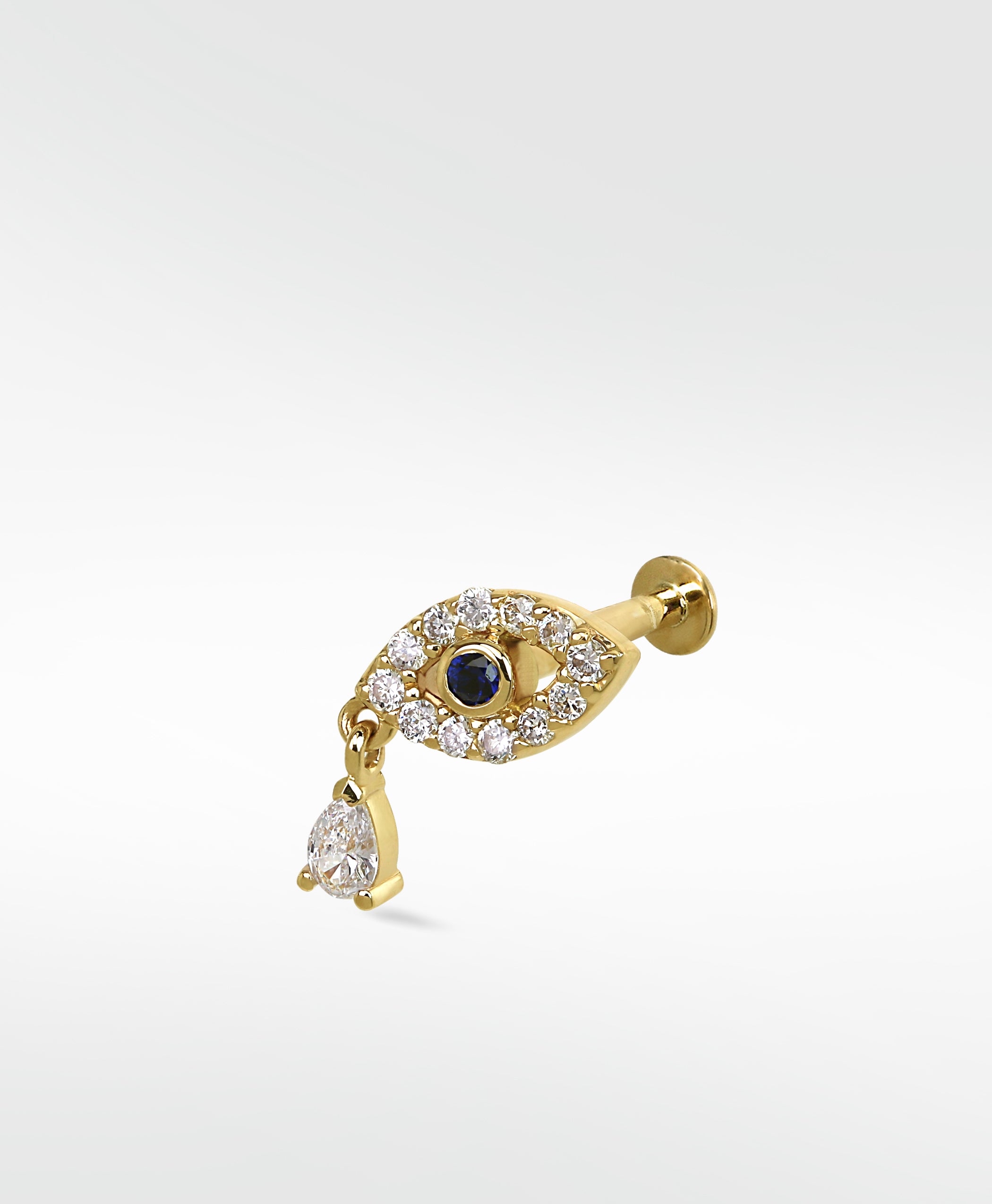 14k gold evil eye stud earring with a sapphire center, diamond pavé, and a dangling teardrop diamond against a white background.