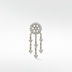 A single Dreamcatcher Diamond Drop earring in white gold with a pavé stud and three dangling chains with diamond charms.