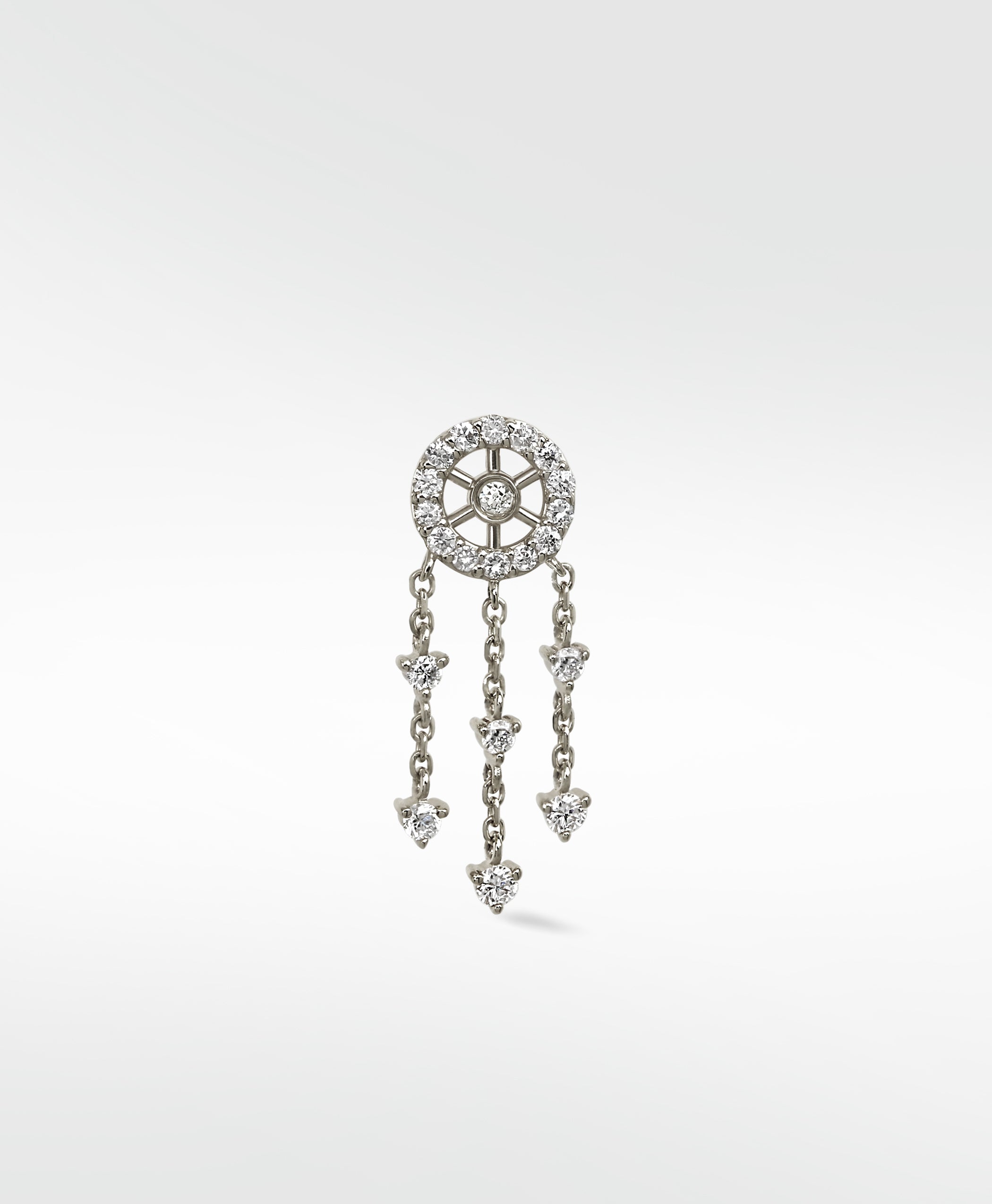 A single Dreamcatcher Diamond Drop earring in white gold with a pavé stud and three dangling chains with diamond charms.