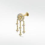 A yellow gold Dreamcatcher Diamond Drop labret earring with dangling chains on a white background.