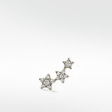 Lark & Berry 3-Star Diamond Stud earring with three ascending stars encrusted with brilliant pavé diamonds on a white gold setting.