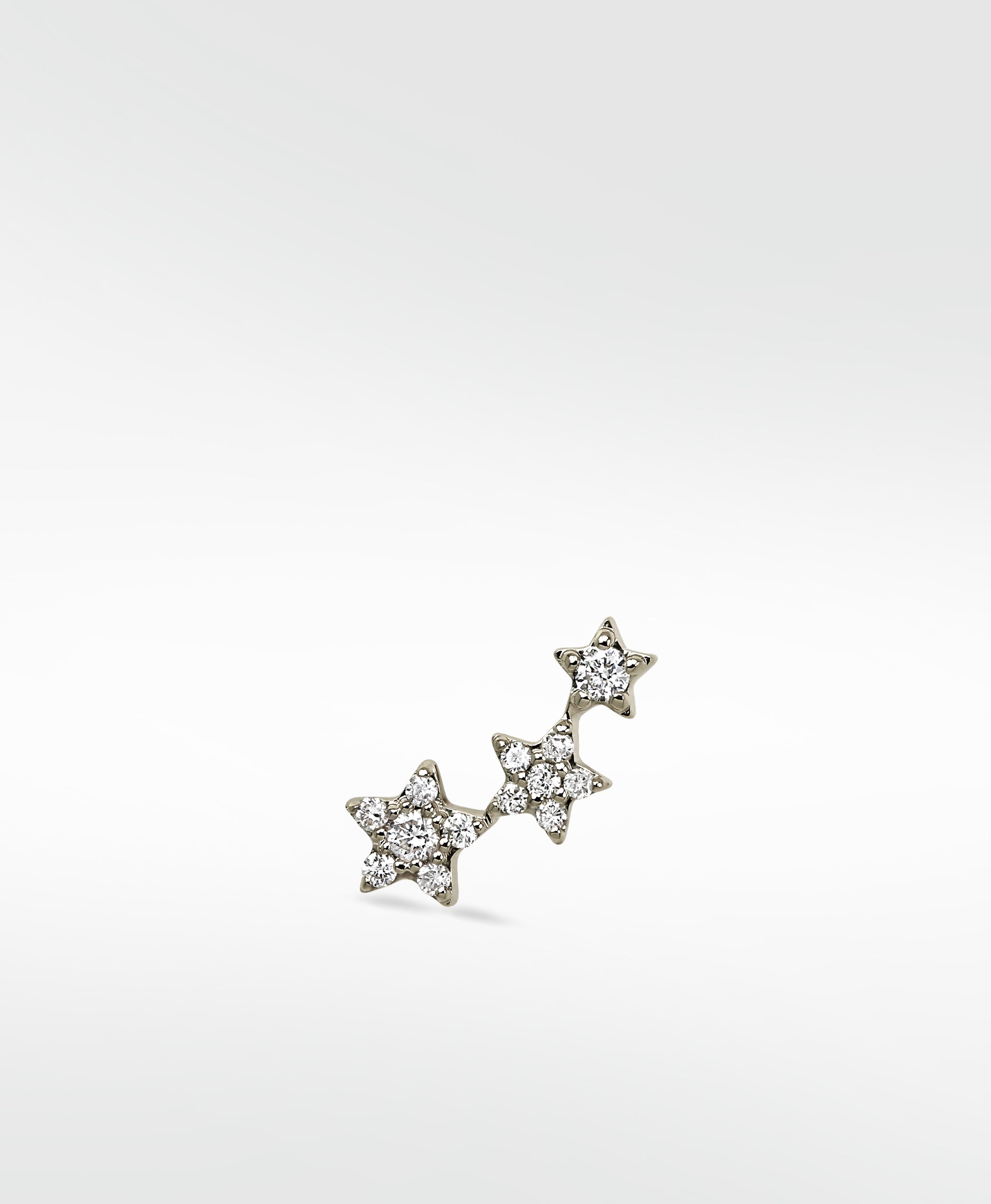 Lark & Berry 3-Star Diamond Stud earring with three ascending stars encrusted with brilliant pavé diamonds on a white gold setting.