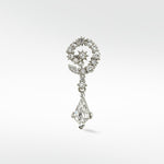 A 14k white gold Celestial Swirl Diamond Stud with a pavé crescent, star detail, and a dangling kite-shaped diamond drop.