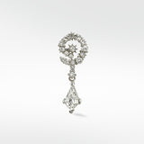 A 14k white gold Celestial Swirl Diamond Stud with a pavé crescent, star detail, and a dangling kite-shaped diamond drop.