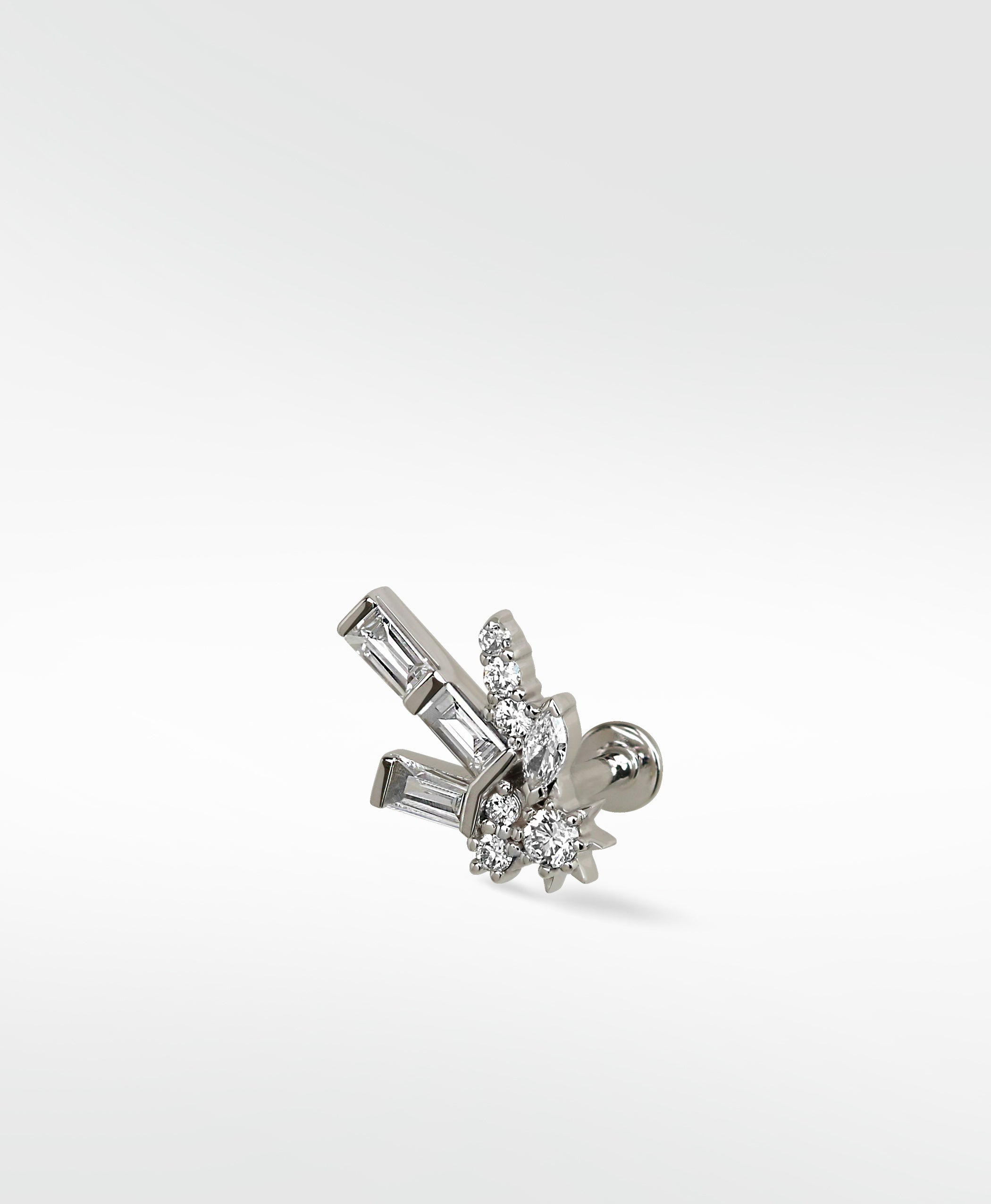 A Lark & Berry Firework diamond stud in white gold, featuring a cluster of baguette, round, and marquise cut diamonds.