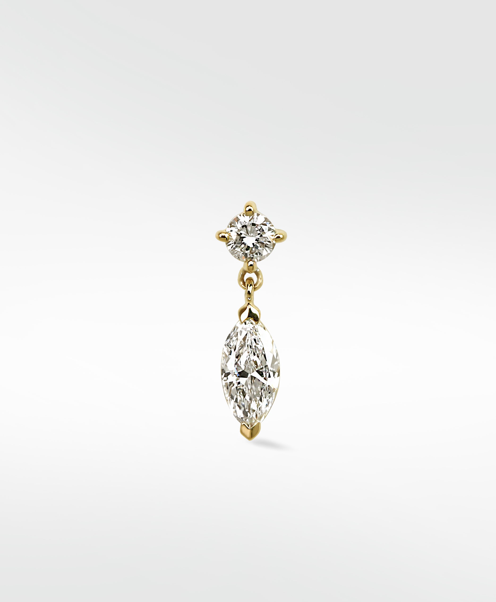 Marquise Double Diamond Drop Stud earring in yellow gold with a round diamond stud and a dangling marquise-cut diamond.