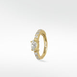 Lark & Berry Modernist Oval Diamond Hoop in yellow gold with pavé diamonds, shown at a slight angle on a white background.