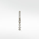 A single Modernist Celestial Drop Hoop earring in white gold, with a dangling drop of four star-set diamonds.