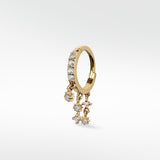 Lark & Berry Modernist Celestial Drop Hoop earring in gold with pavé diamonds and dangling star charms.