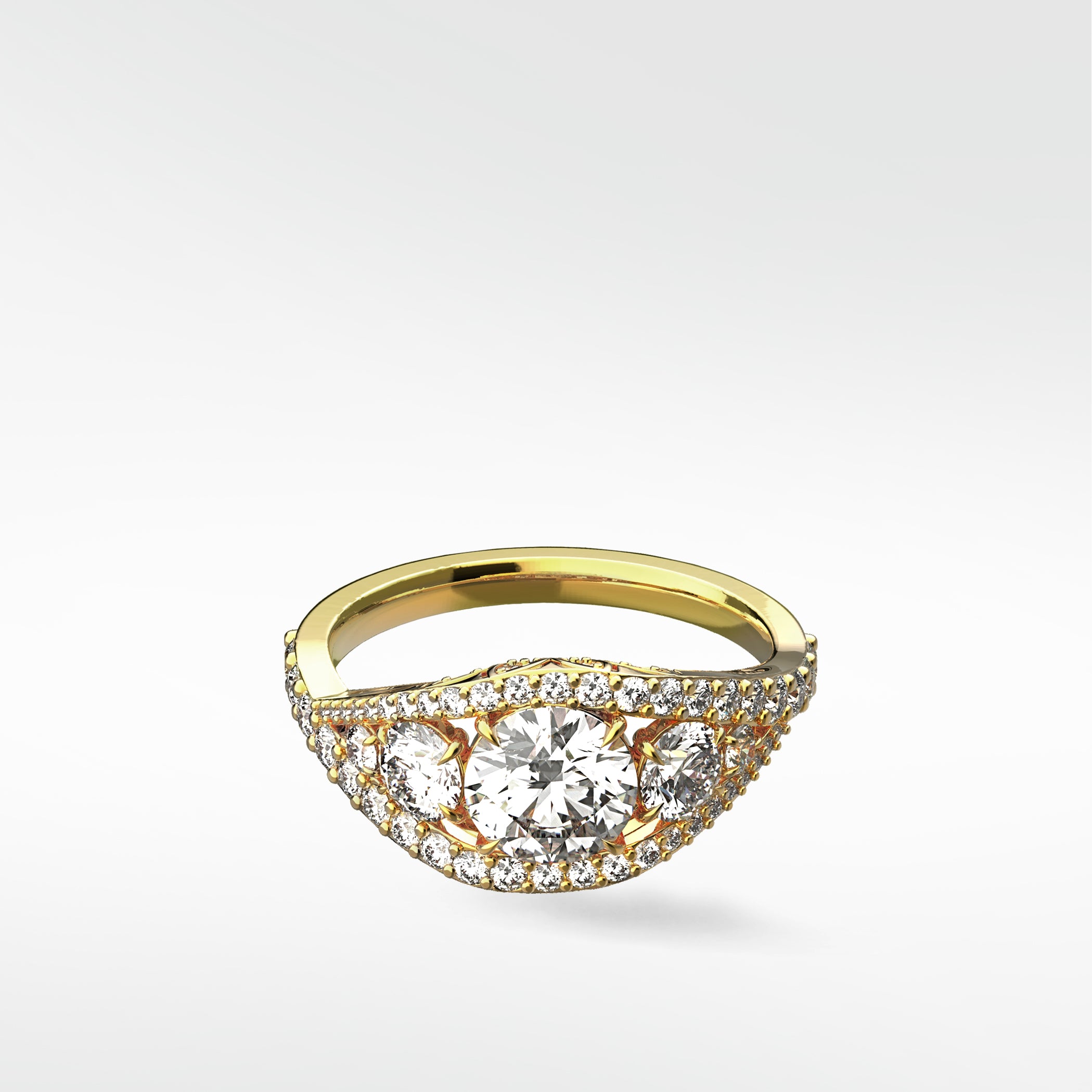 The Torreya Diamond Engagement Ring in yellow gold, featuring a three-stone setting on a curved, pavé diamond band.