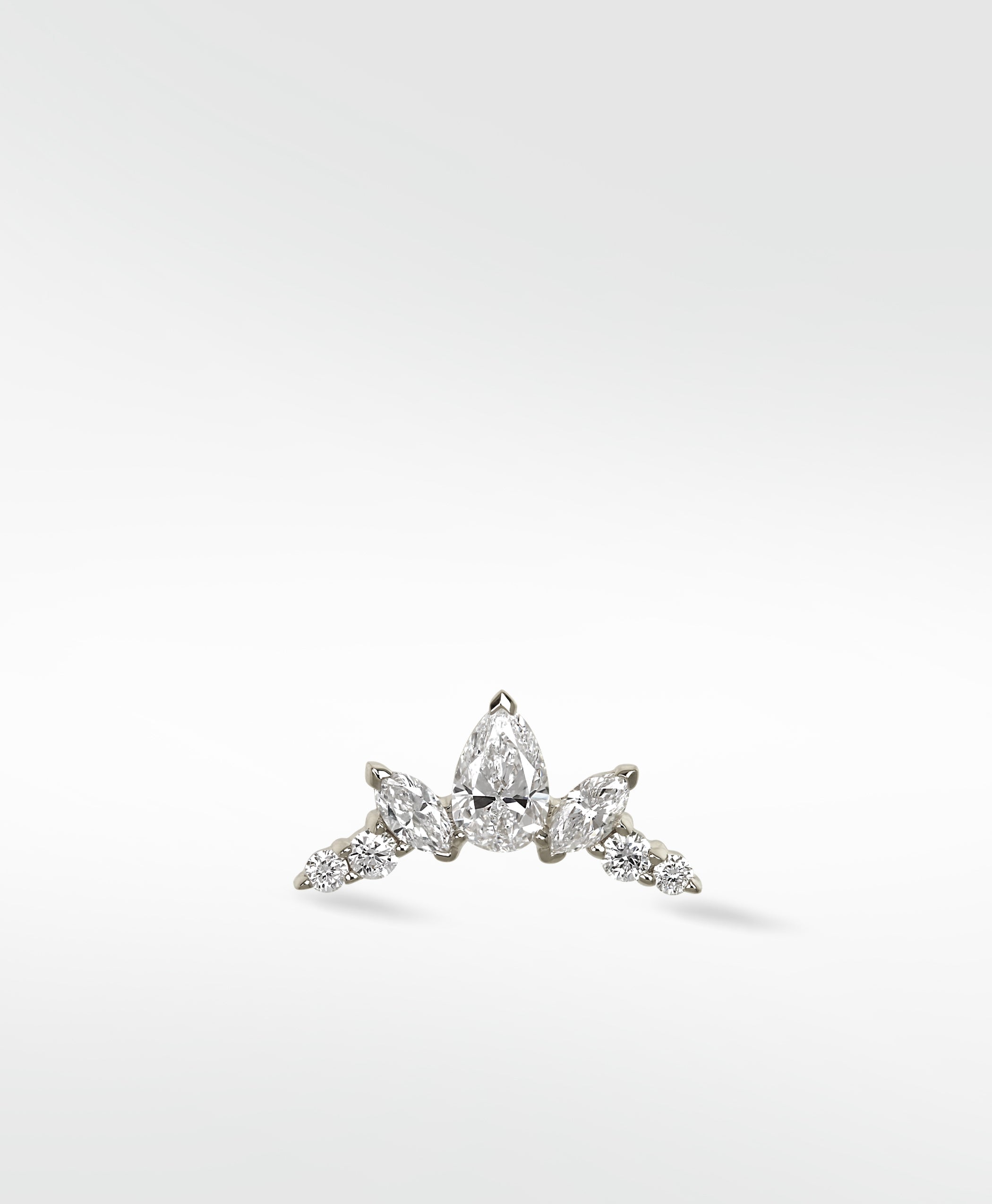 Lark & Berry Crown Crawler Independence earring in white gold with pear, marquise, and round diamonds.