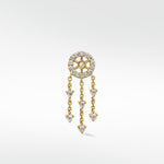 Gold dreamcatcher earring with a pavé diamond stud and dangling chains with diamond drops.