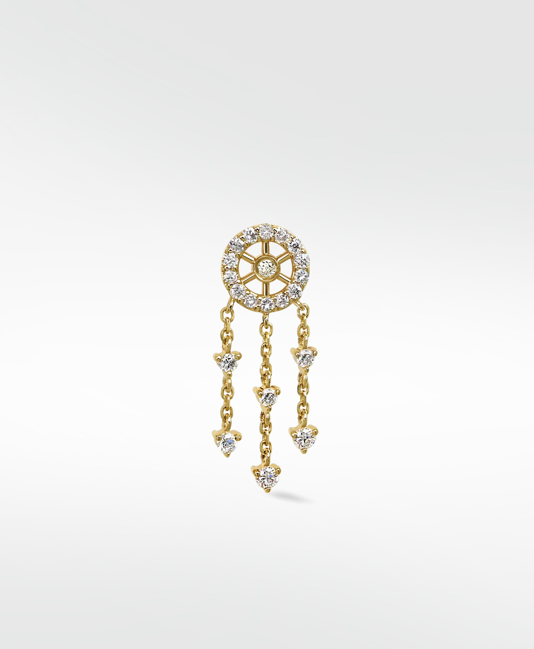 Gold dreamcatcher earring with a pavé diamond stud and dangling chains with diamond drops.