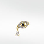 14k gold evil eye earring with pavé diamonds, a sapphire center, and a single pear-shaped diamond drop.